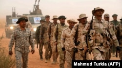Бойцы одной из ливийских вооруженных группировок – "Гвардии защиты нефтяных объектов". Город Бир аль-Ганам, март 2021 года