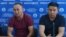 Qaster Musakhanuly (left) and Murager Alimuly appear at a press conferences in Almaty on October 14.