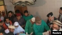 Doctors attend to people injured in a militant attack on Bacha Khan University, Charsadda in Pakistan's northwestern Khyber Pakhtunkhwa province on January 20.