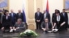 Armenia - Igor Sechin (L), chairman of Rosneft, and Artur Alaverdian of Oil Techno sign an agreement in Yerevan, 4Apr2013.