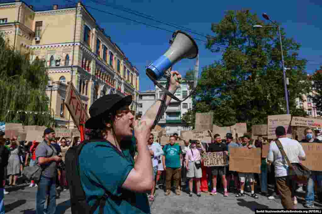 A man uses a loudspeaker during the protests in Kyiv on July 16.
