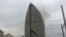 Smoke billows from the 33-floor hotel and condominium tower, one of the tallest buildings in Baku.