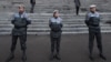 Armenia - Riot police guard the main entrance to Yerevan State University during an opposition protest against official results of the February 18 presidential election, 28Feb2013.