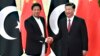 Chinese President Xi Jinping (right) shakes hands with Pakistani Prime Minister Imran Khan before a meeting at the Great Hall of the People in Beijing in April 2019.