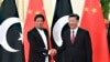 CHINA -- Chinese President Xi Jinping (R) shakes hands with Pakistani Prime Minister Imran Khan before their meeting at the Great Hall of the People in Beijing, April 28, 2019