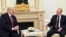 Alyaksandr Lukashenka meeting Vladimir Putin in Moscow in April (file photo)