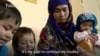 WATCH: Afghan Mother Speaks Of University Goals After Image Goes Viral