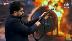 Iranian TV Presenter Fires Gun At UAE Flag Amid Growing Public Militarization