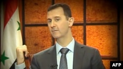 President Bashar al-Assad gives an interview to Turkish media in Damascus on April 3.