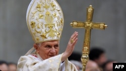 Pope Benedict XVI celebrates Christmas Mass at St. Peter's Basilica in Vatican City on December 24.