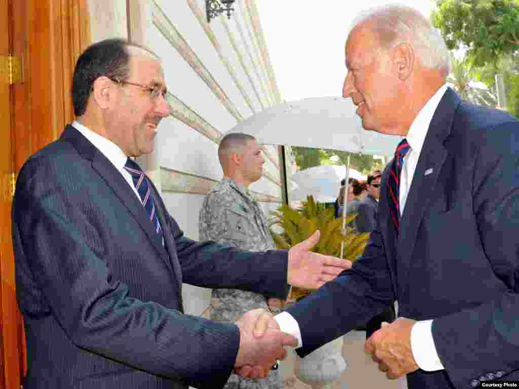 Iraq -- Prime Minister Nuri al-Maliki greets US Vice Predident Joseph Biden during his visit to Baghdad, 31Aug2010 - Iraqi PM Nuri al-Maliki receives US Vice Predident Joseph Biden during his visit to Baghdad.