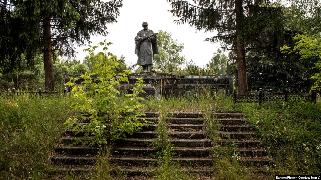 Thirty-five years after Soviet Ukraine's infamous nuclear disaster, a photographer has uncovered the haunting and often carefully maintained World War II monuments that endure in the forests of the Chernobyl exclusion zone.