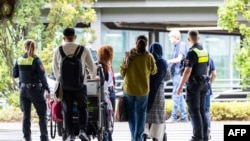 گروهی از پناهجویان افغان که در ماه دسمبر ۲۰۲۵ از پاکستان به جرمنی منتقل شدند.