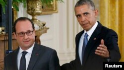 Президент США Барак Обама принимает в Белом доме президента Франции Франсуа Олланда 24 ноября 2015 года 
