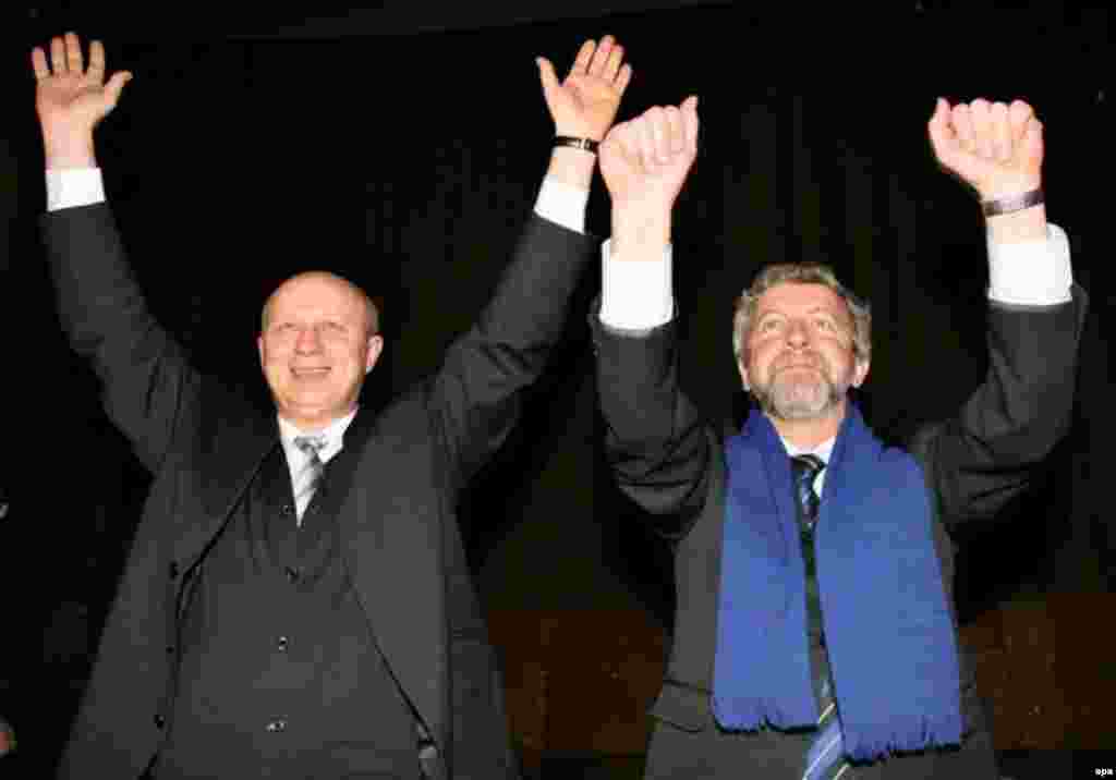 Opposition presidential candidates Alyaksandr Kazulin (left) and Alyaksandr Milinkevich at a rally in March 2006 - Many observers wonder whether Alyaksandr Kazulin will be the next in line to be released. A former presidential candidate, Kazulin was arrested during antigovernment demonstrations that followed the March 2006 election, and sentenced to 5 1/2 years in prison for organizing events that disturbed public order. 