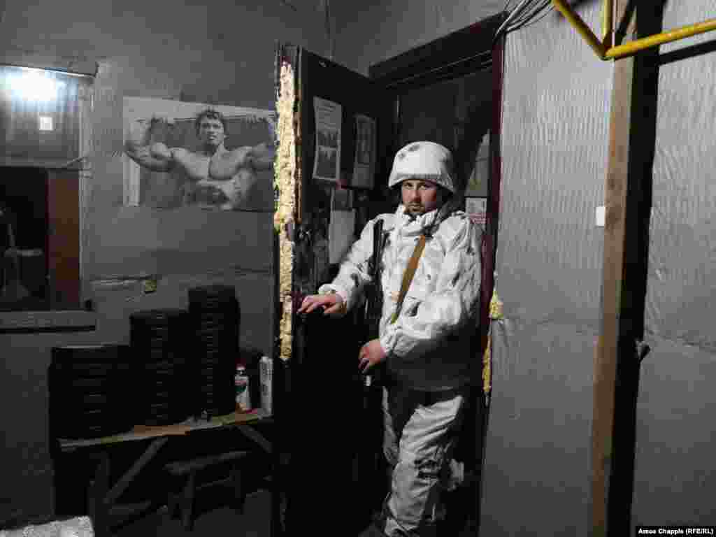 A Ukrainian soldier prepares to make a trip to the front line in the country&#39;s war-torn Luhansk region.&nbsp;