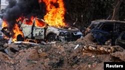 Urmările căderii unei rachete iraniene la Tel Aviv, Israel, pe 24 martie 2026.