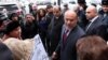 Armenia - Defense Minister Seyran Ohanian is confronted by parents of dead soldiers outside the prime minister's office in Yerevan, 19Jan2012.