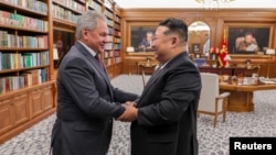 Sergey Şoyqu və Kim Çen In