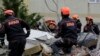 ALBANIA -- Turkish rescuers search at a collapsed building in Durres, western Albania, November 28, 2019