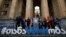 Women's right activists rally in front of the parliament building on International Women's Day in Tbilisi on March 8.