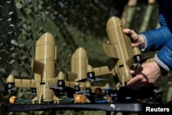 A Sting interceptor drone by the Ukrainian company Wild Hornets is displayed at an undisclosed location in Ukraine in March.