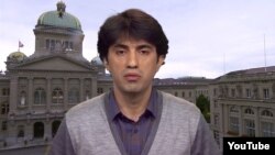 Switzerland -- Azerbaijan activist Emin Huseynov in exile: 'I'm afraid for my life'