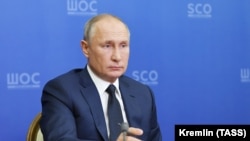 Russian President Vladimir Putin attends the Shanghai Cooperation Organization meeting via video conference in the Black Sea resort of Sochi on November 10.