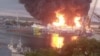 Пожежа на нафтовому термыналы у Керчі. До початку Керченського мосут 1 кілометр. Окупований Крим, 21 червня 2026 року