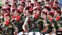 Iraqi military soldiers parade during a ceremony marking victories over Islamic state group in central Baghdad, Iraq, 14 July 2016