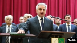 Raul Khajimba taking the oath at his inauguration as Abkhaz leader in Sukhumi on September 25, 2014