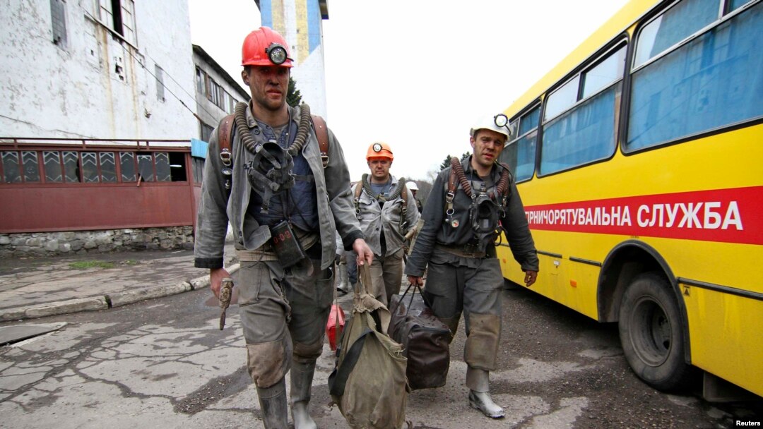 Employees walk near the Skochynskyy Mine outside Donetsk on April 11. 