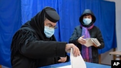 Many Romanians, some wary of the coronavirus pandemic, didn't vote. 