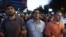 Armenia - Opposition leaders Andrias Ghukasian (C), Armen Martirosian (R) and Davit Sanasarian lead an anti-government march in Yerevan, 29Jul2016.