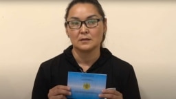 Казашка из Китая Кайша Акан со свидетельством лица, ищущего убежище