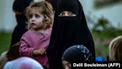 Women and children at the Al-Hawl refugee camp in November 2020. Of the some 400 Tajik women and children at the camp, only 260 people applied for repatriation.