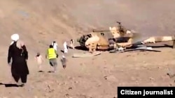 عکسی از هلیکوپتر طالبان که در ولایت غور سقوط کرد.