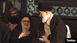 Reformist cleric Ayatollah Seyyed Mohammad Mousavi Khoeiniha (L) with Supreme Leader Ali Khamenei. Undated photo. 