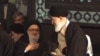 Ayatollah Seyyed Mohammad Mousavi-Khoiniha with Supreme Leader Ali Khamenei. Undated photo. 