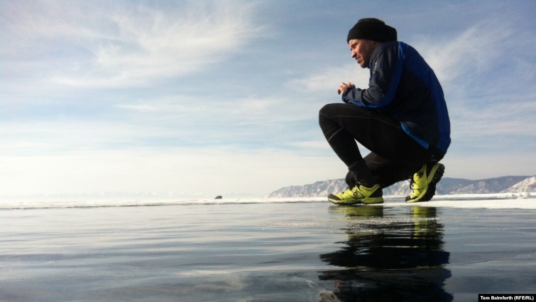 More than 100 people ran the marathon across Russia's Lake Baikal.