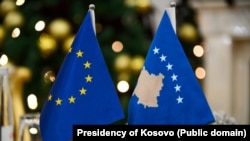 The EU and Kosovo flags