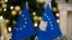 The EU and Kosovo flags