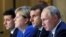 Ukrainian President Volodymyr Zelenskiy, (left to right) German Chancellor Angela Merkel, French President Emmanuel Macron, and Russian President Vladimir Putin attend a press conference after a summit on Ukraine at the Elysee Palace in Paris in December 2019.