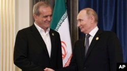 د روسیې او ایران ولسمشران په چین کې د لیدنې پرمهال