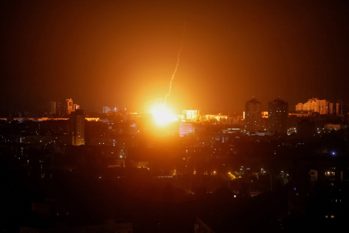 An explosion lights up the sky over Kyiv during a Russian missile and drone attack, Kyiv, Ukraine, July 19, 2026