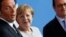 Italian Prime Minister Matteo Renzi with German Chancellor Angela Merkel (center), and French President Francois Hollande (right) in Berlin in June