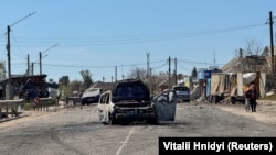 Ілюстраційне фото. Згорілий внаслідок російьської атаки автомобіль, Харківщина, 4 травня 2026 року