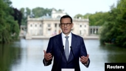 Premierul polonez Mateusz Morawiecki la o conferință de presă, Varșovia, iulie 2023. 