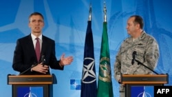 NATO Secretary-General Jens Stoltenberg (left) and NATO's top military commander, General Philip Breedlove, address the media at the headquarters of Allied Command Operations in Casteau, Belgium on March 11.
