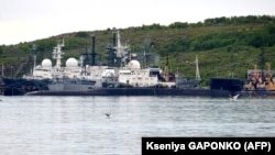 A picture taken on July 2 shows an unidentified submarine in the Russian port of Severomorsk, the base of Russia's Northern Fleet.